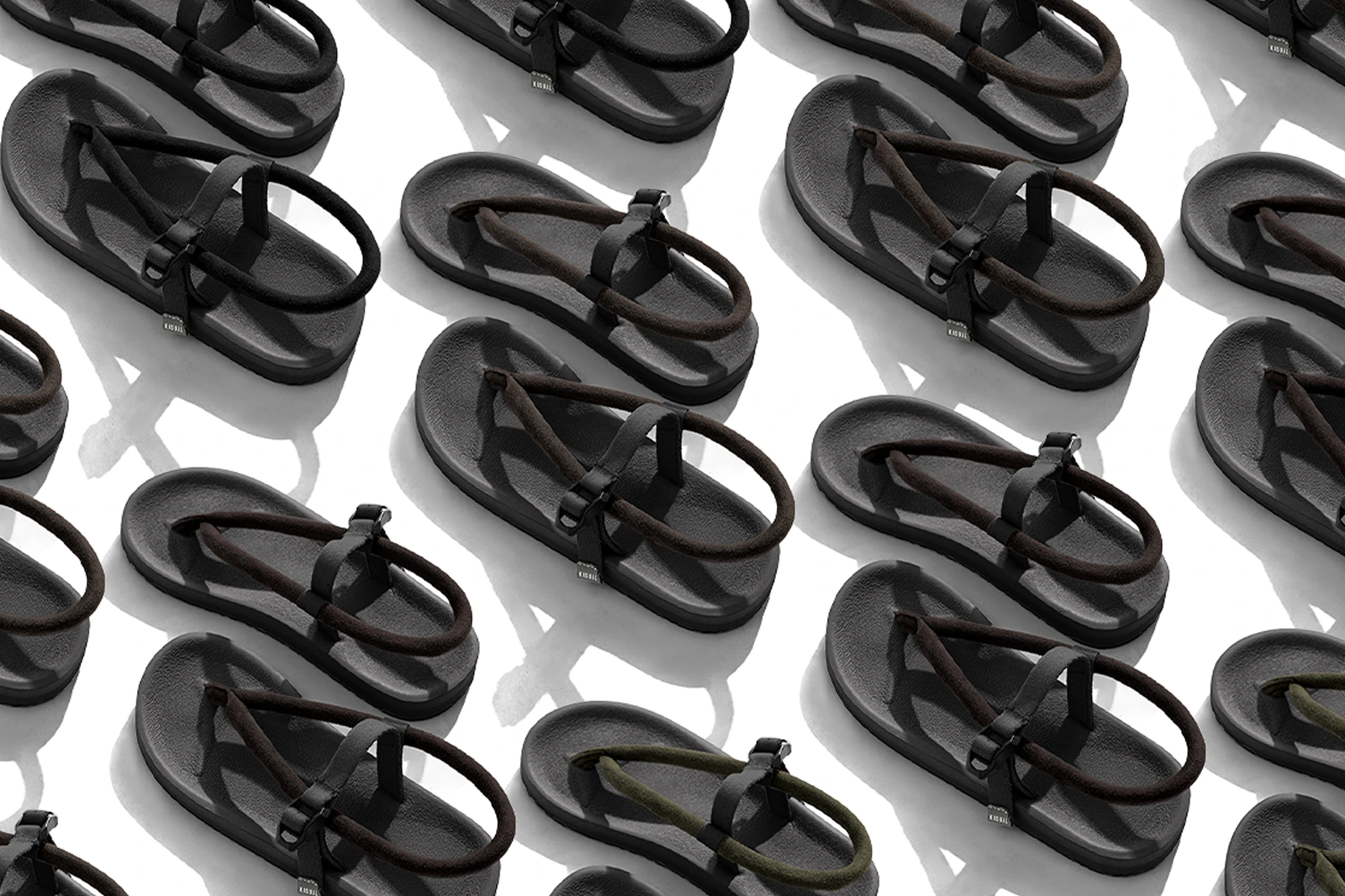 Kasual x Gahalu Wakatobi sandals worn with cream trousers.