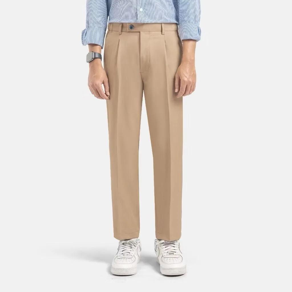 Men's pants size guide: khaki ankle pants measured flat on the floor